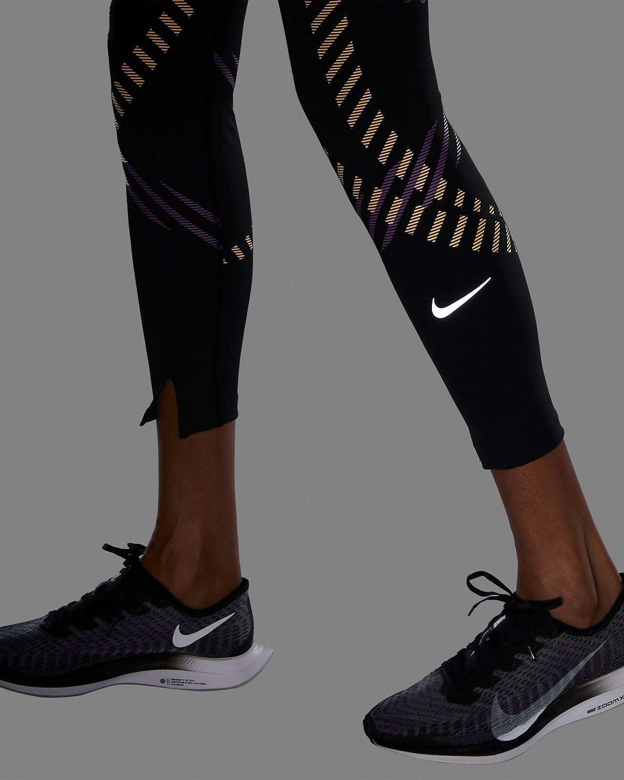 Nike Speed Women's Mid-Rise 7/8 Graphic Running Leggings
